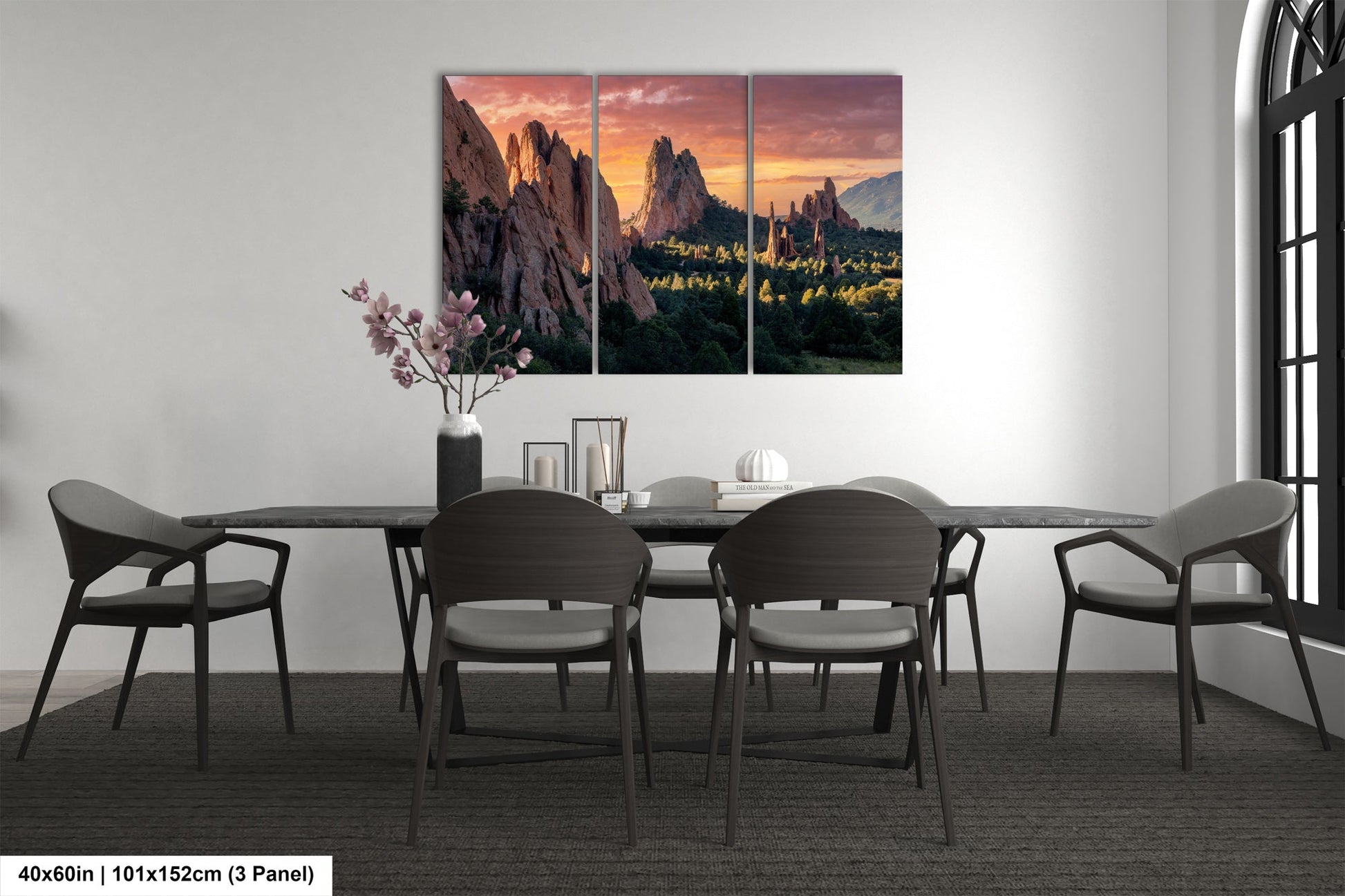 a dining room with a table and chairs
