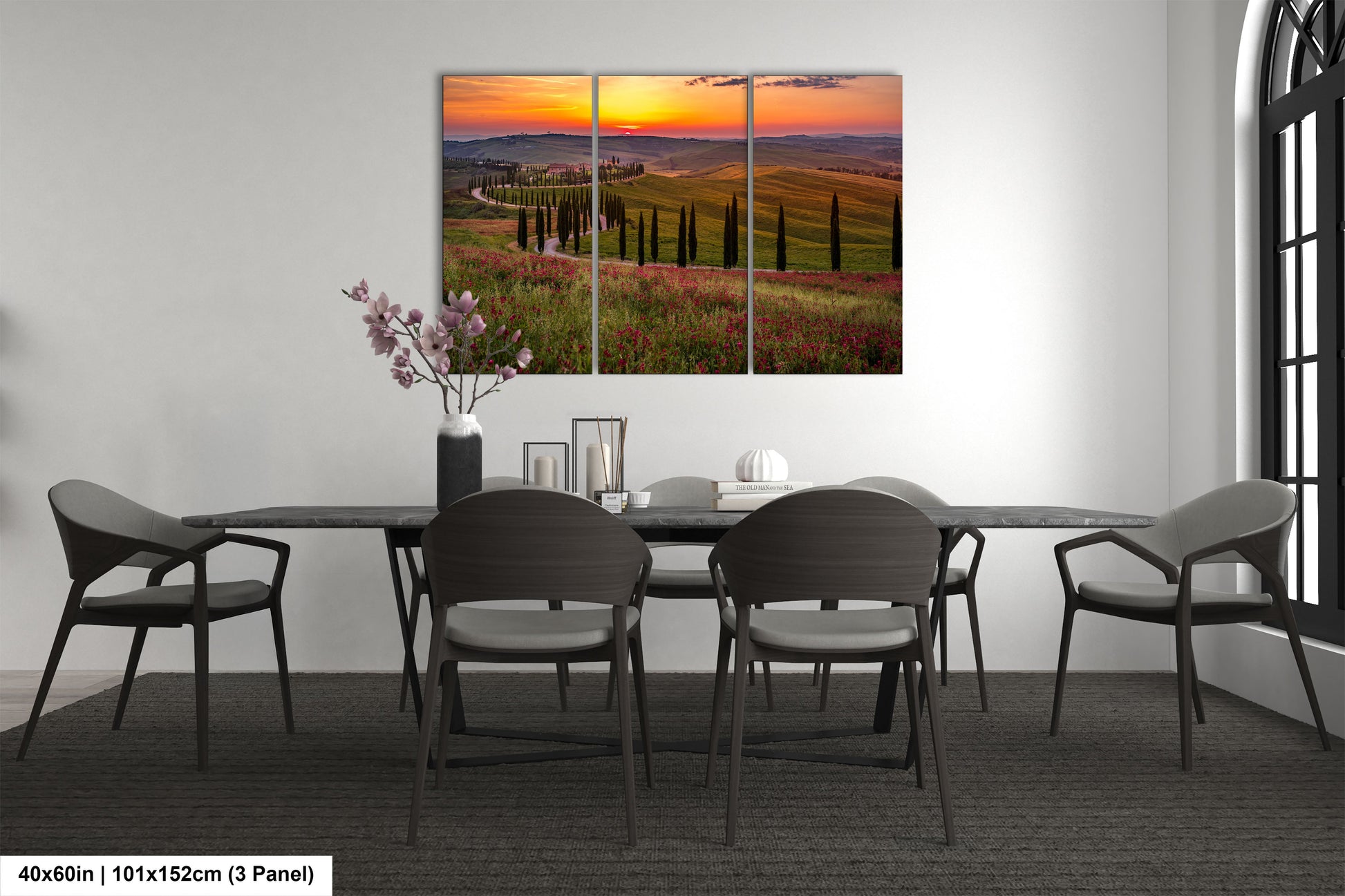 a dining room with a table and chairs