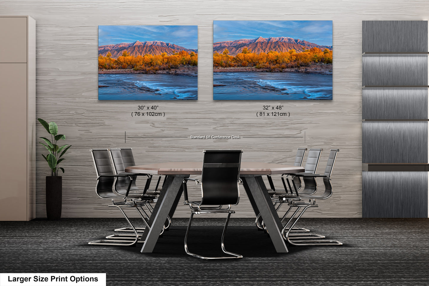 a dining room table with chairs and two pictures on the wall