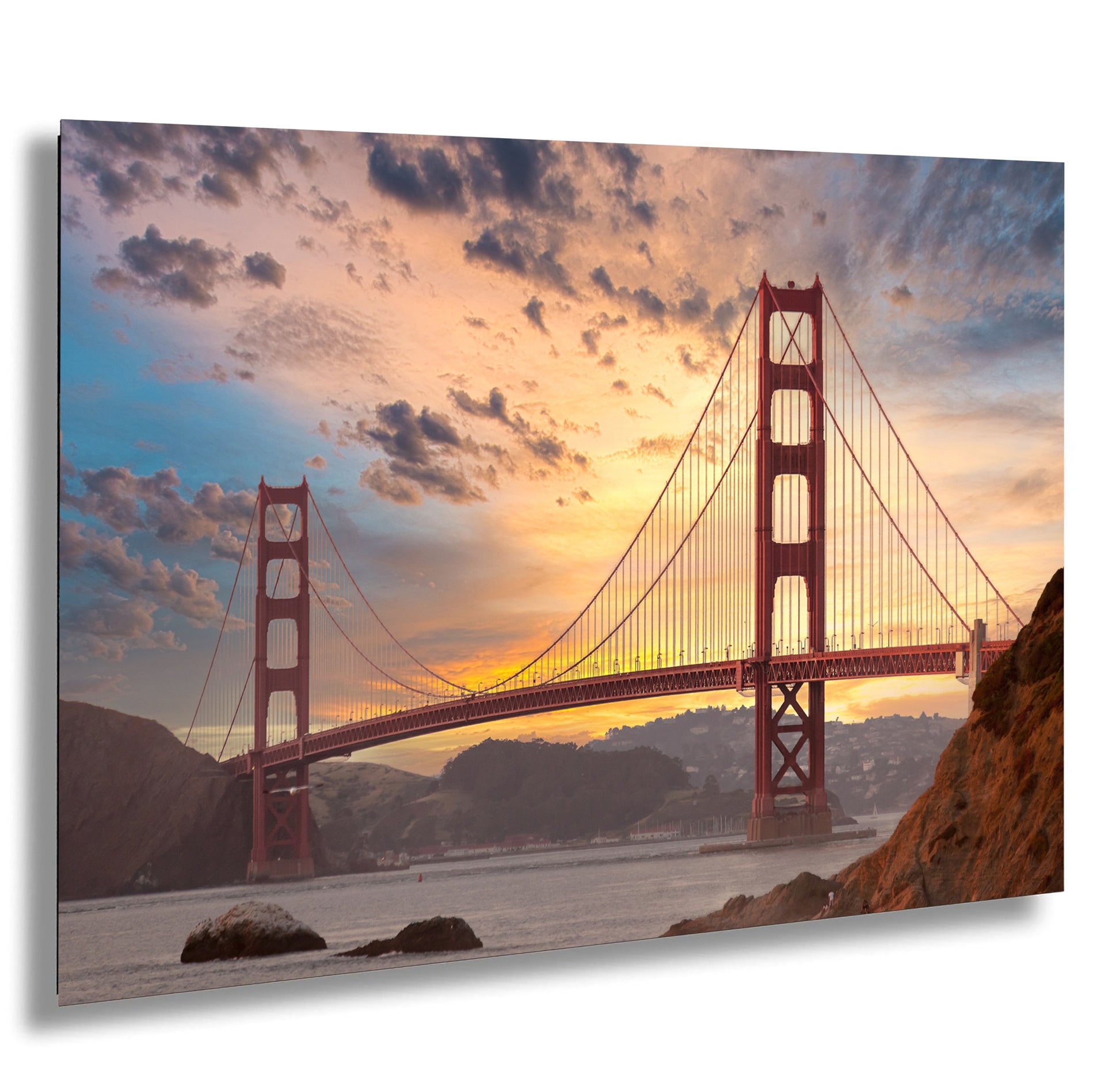 a picture of the golden gate bridge at sunset