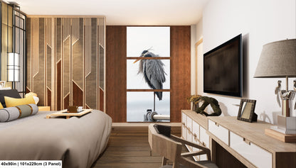 a bed room with a neatly made bed and a flat screen tv