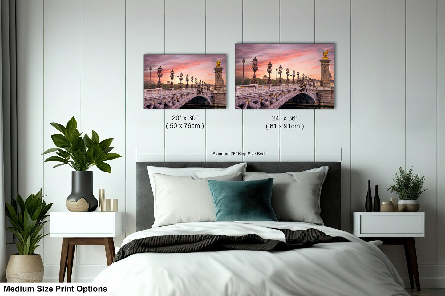 a bed room with a neatly made bed and two pictures on the wall