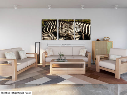 a living room with two zebras standing next to each other