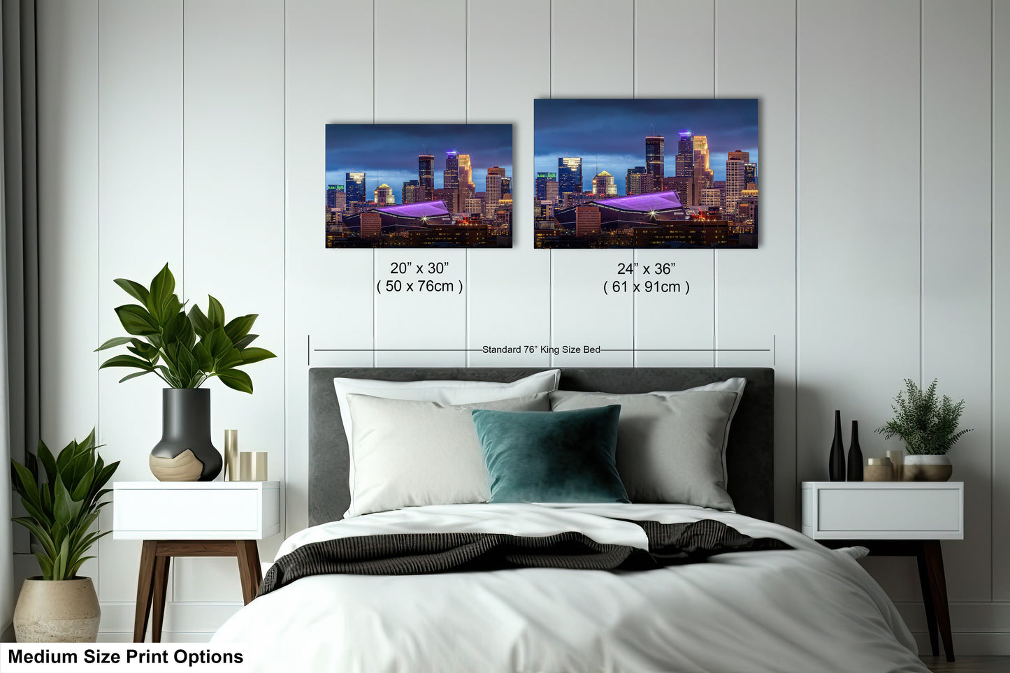 a bedroom with a bed and two pictures on the wall