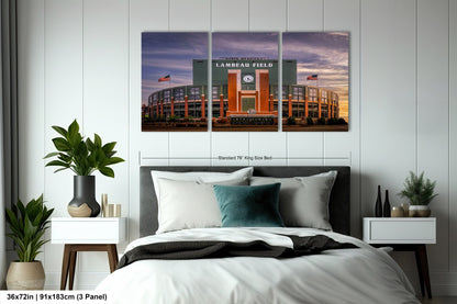 a bed room with a neatly made bed and two paintings on the wall