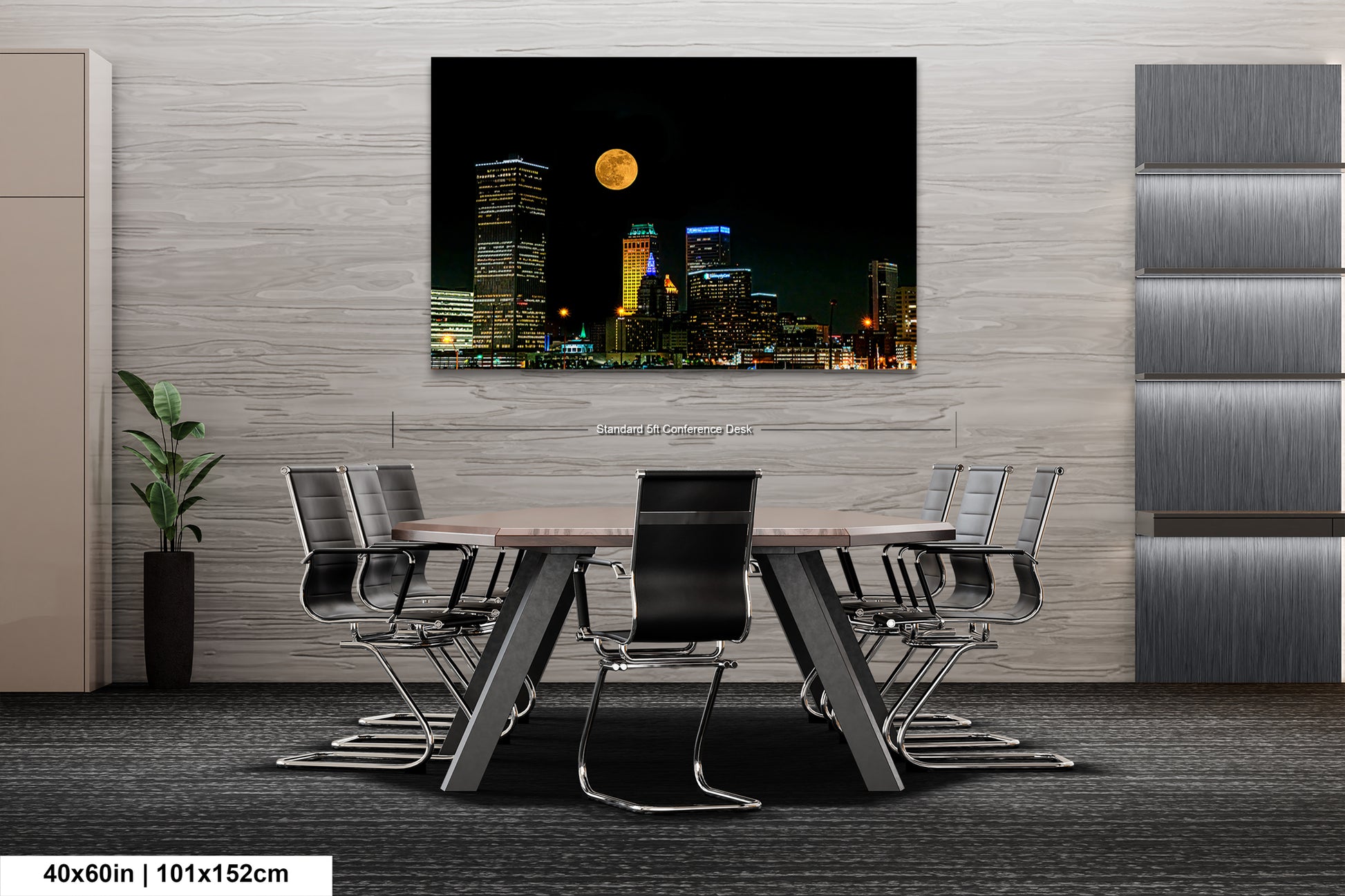 a picture of a city at night with a full moon