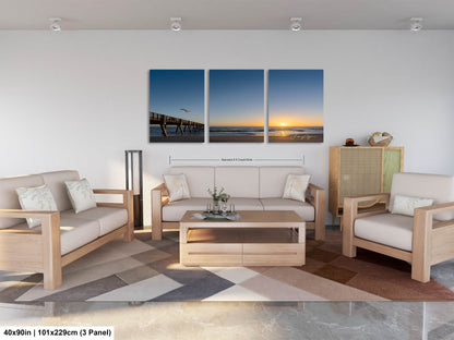 a living room filled with furniture and a painting on the wall