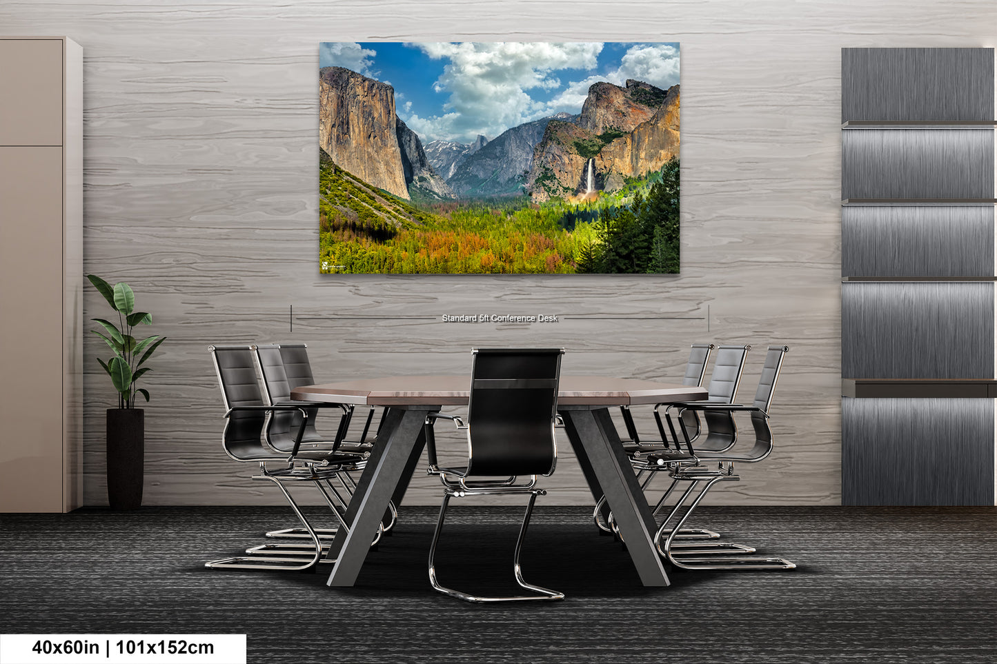 a dining room table with chairs and a painting on the wall
