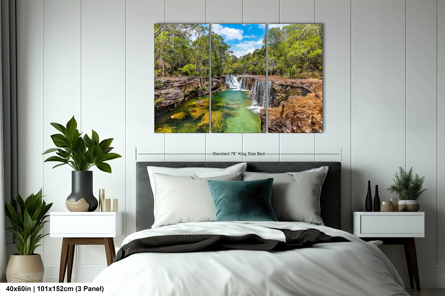 a bedroom with a bed and a painting on the wall