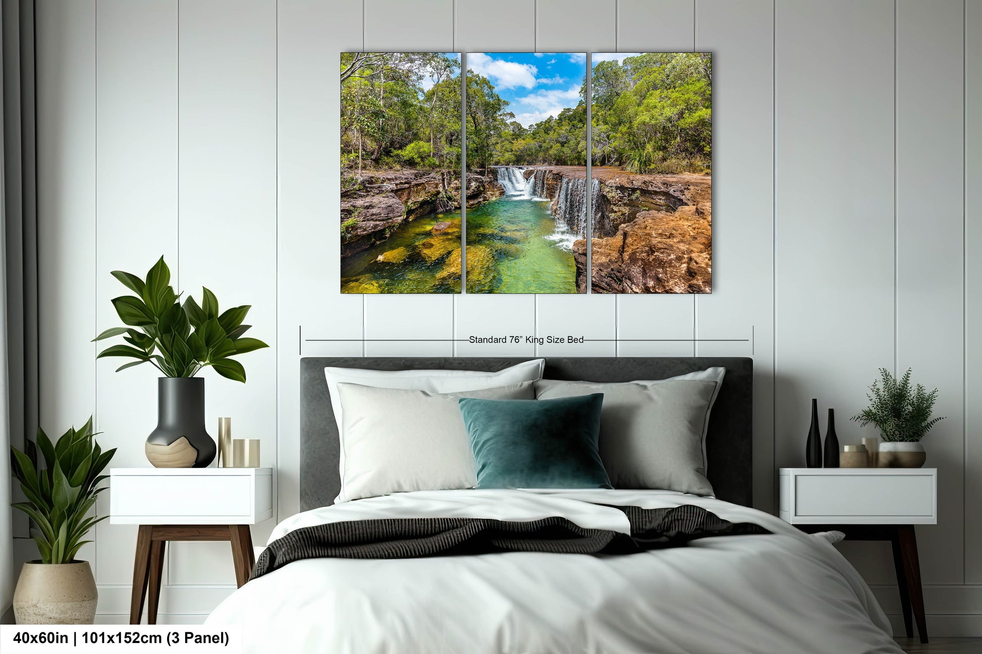 a bedroom with a bed and a painting on the wall