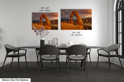 a dining room with a table and chairs