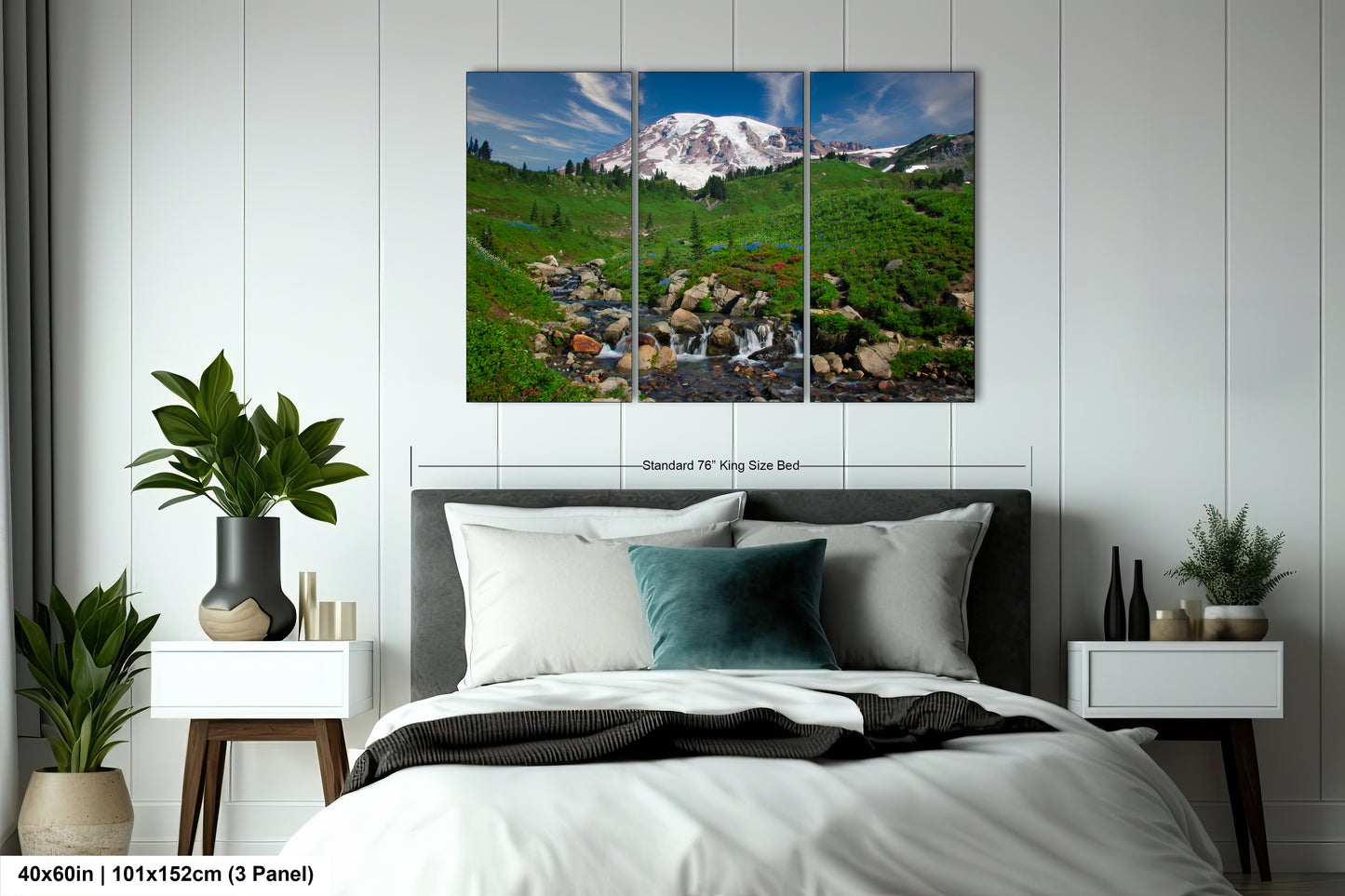 a bed room with a neatly made bed and a painting on the wall