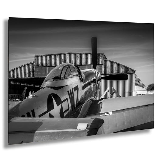 a black and white photo of an old airplane