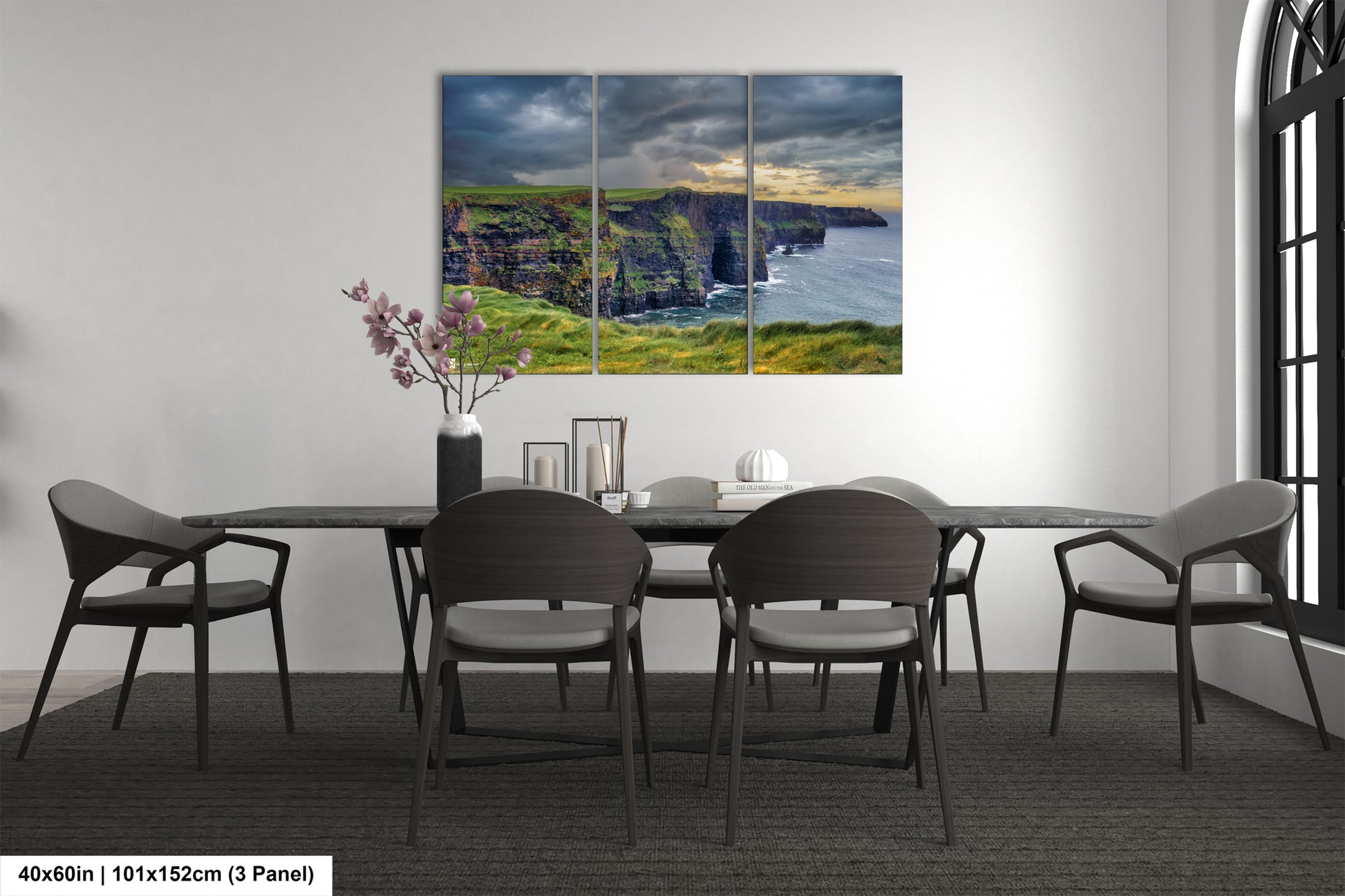 a dining room with a table and chairs