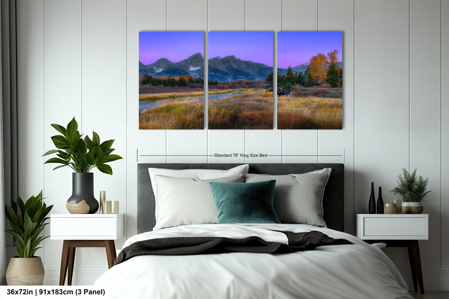 a bedroom with a bed and two paintings on the wall