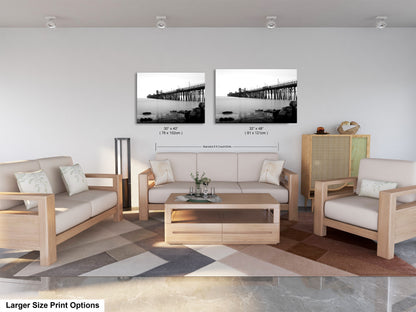 a living room with two pictures on the wall