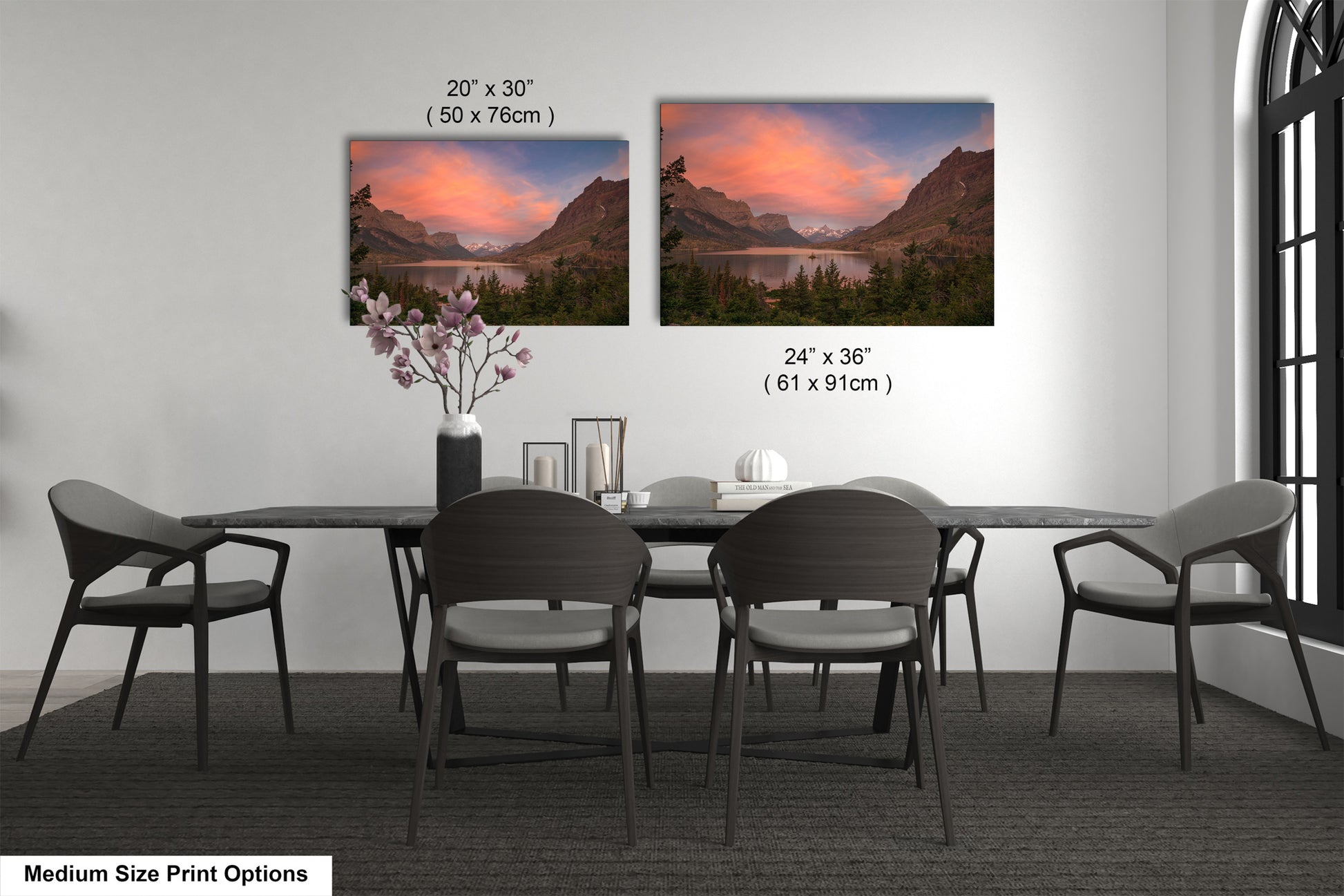 a dining room table with chairs and a vase with flowers