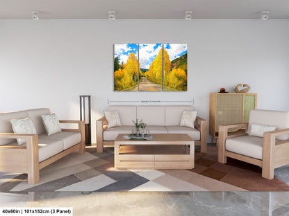 a living room filled with furniture and a painting on the wall