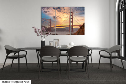 a dining room table with a view of the golden gate bridge