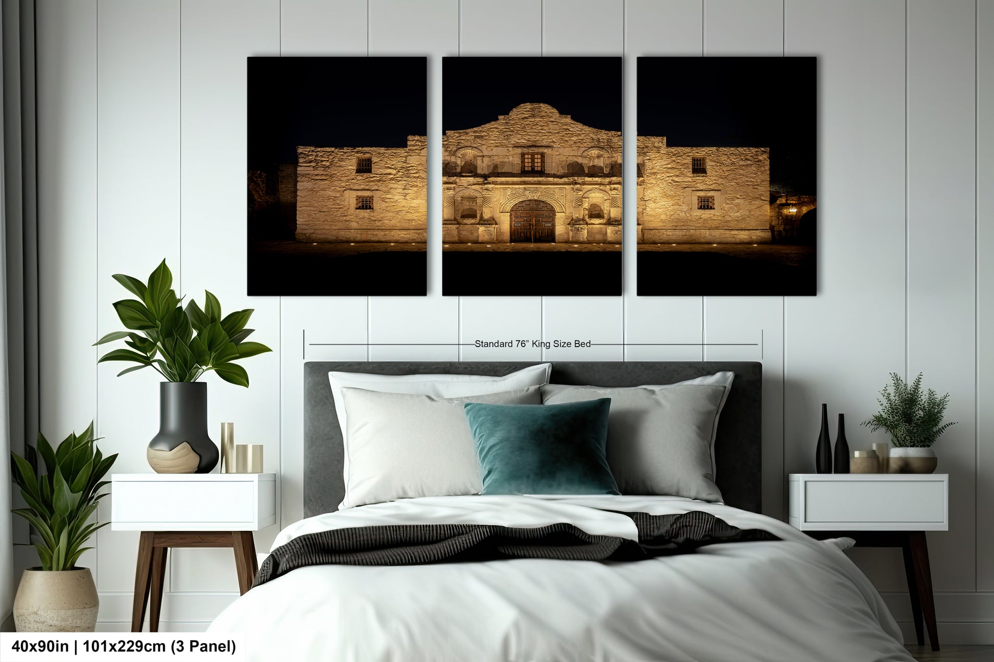 The image is a triptych of a large, illuminated building at night, with the top panel showing the building's facade and the bottom panel showing the interior. The bed in the foreground has a white comforter and a blue throw pillow.
