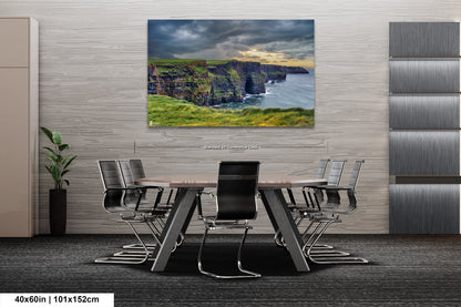 a dining room table with chairs and a painting on the wall