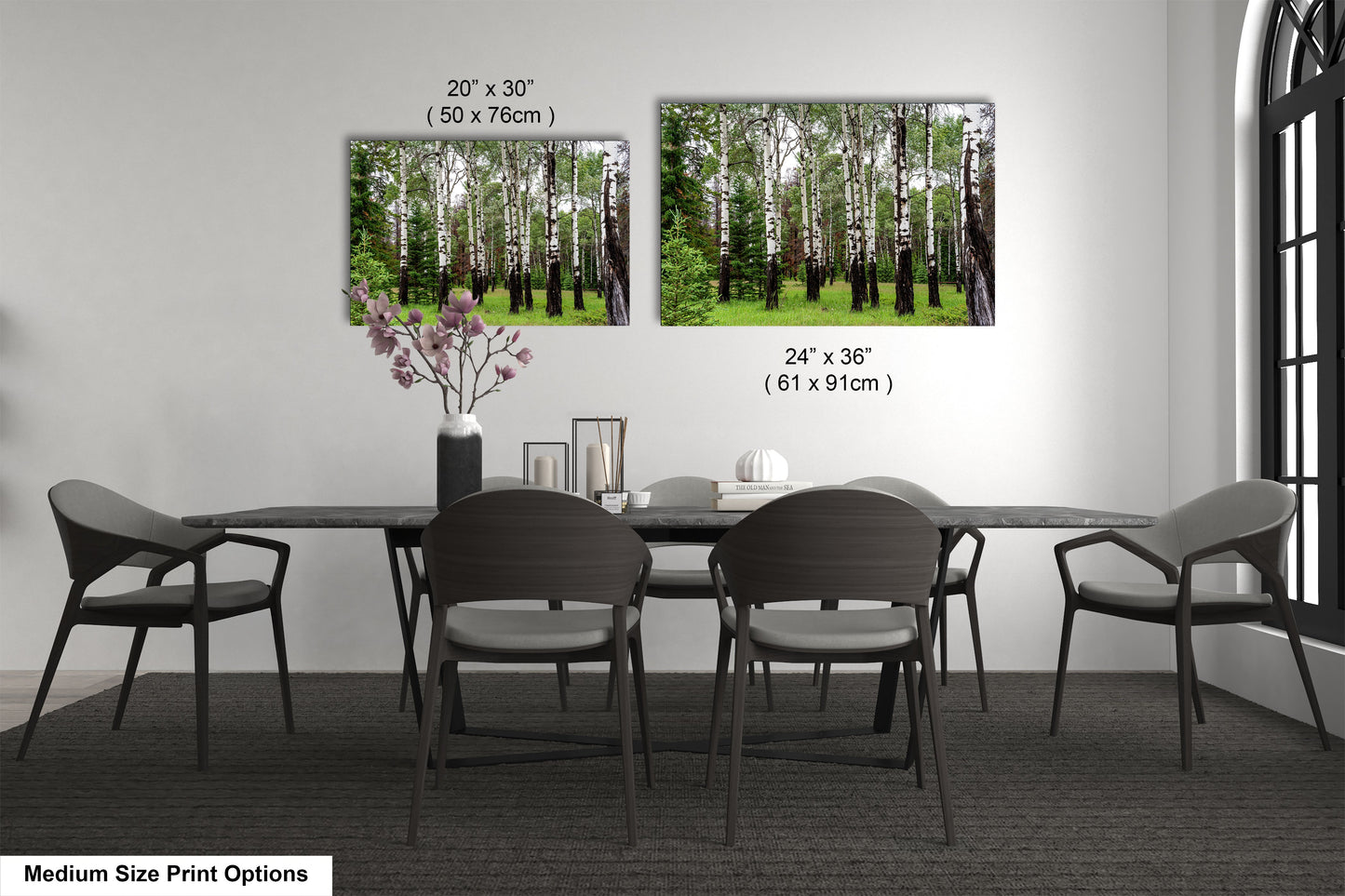 a dining room table with chairs and a vase with flowers