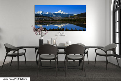 a dining room with a table and chairs