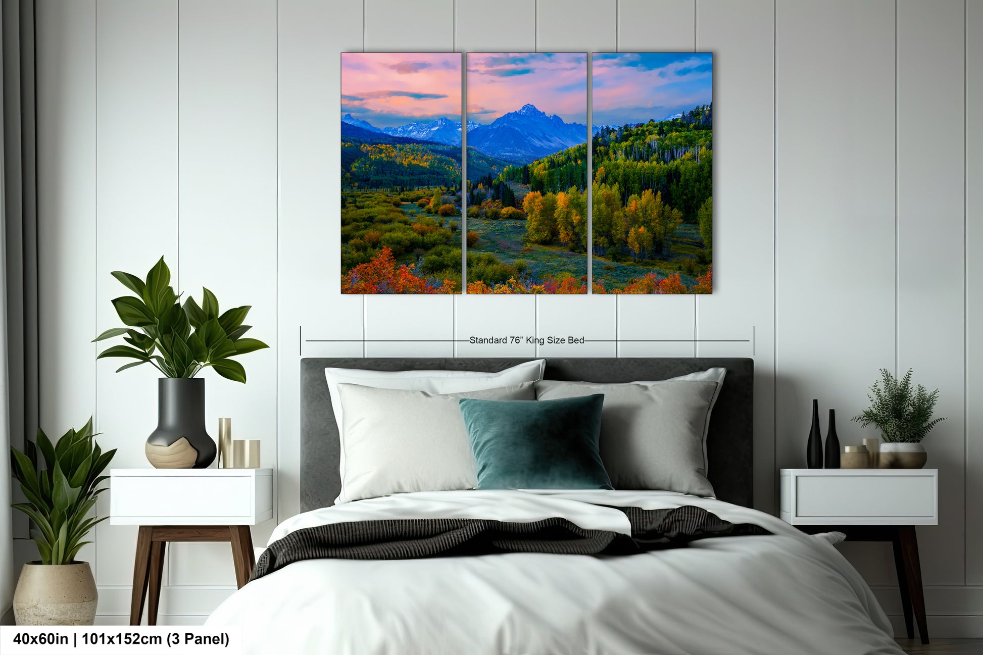 a bedroom with a bed and a painting on the wall