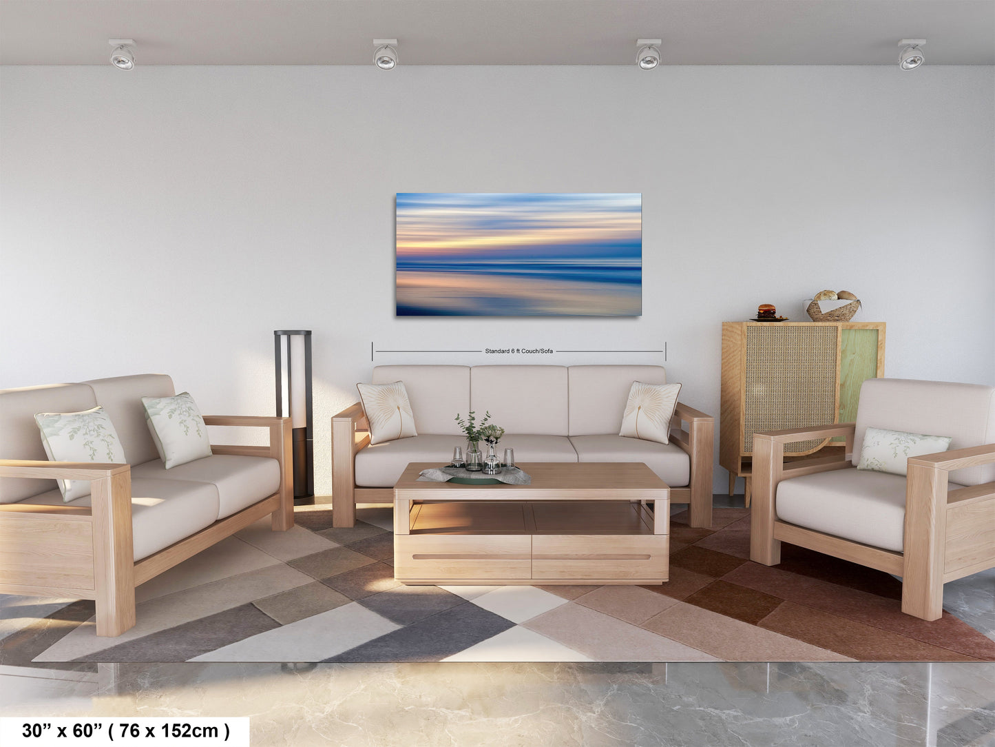 a living room filled with furniture and a painting on the wall