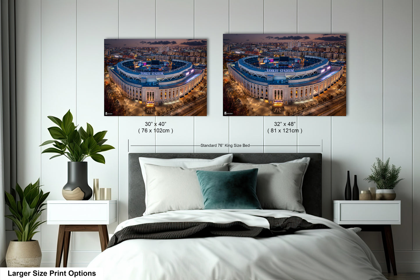 a bedroom with a large bed and two pictures on the wall