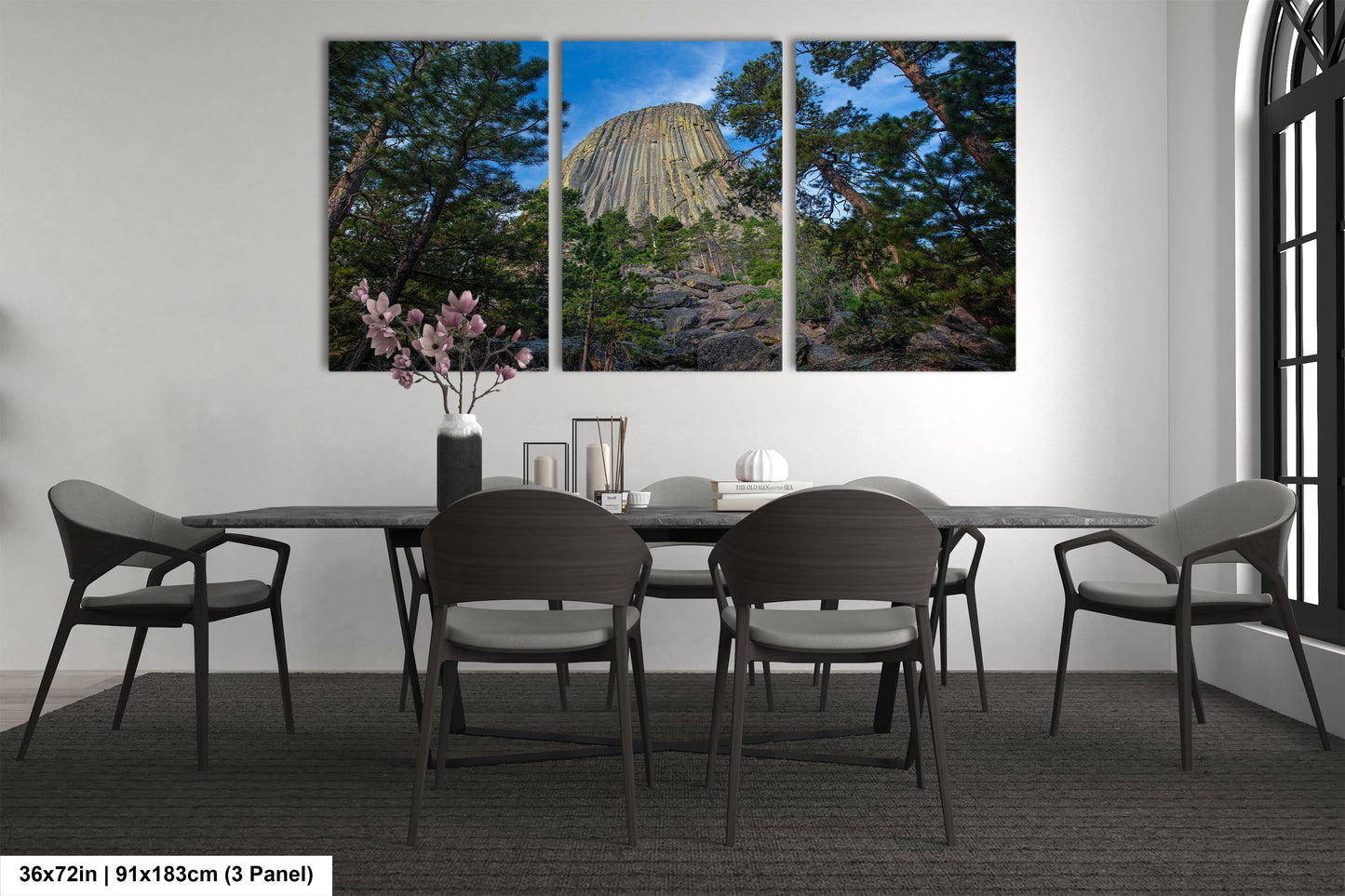 a dining room with a table and chairs