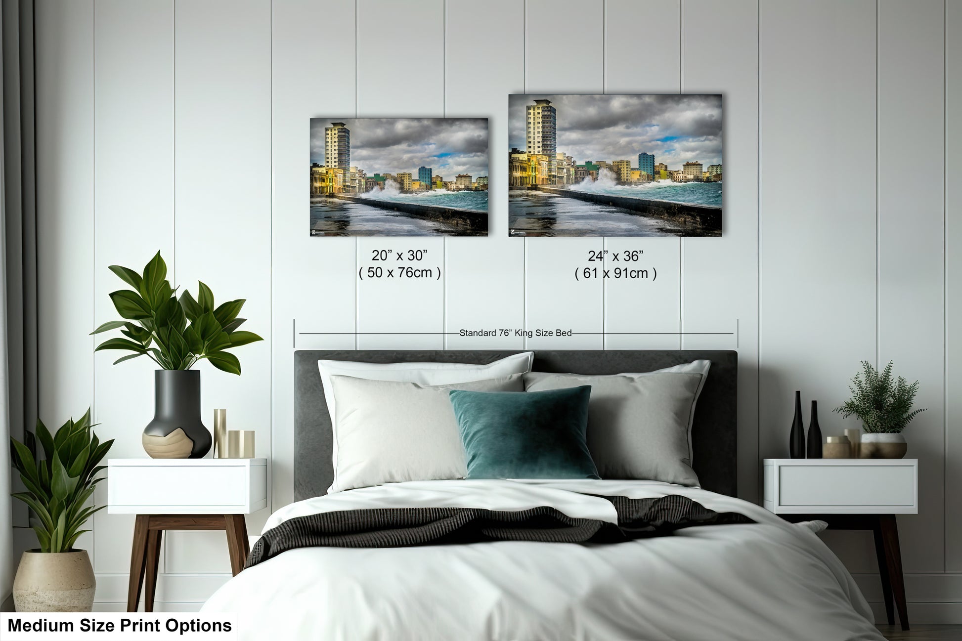 a bed room with a neatly made bed and two pictures on the wall