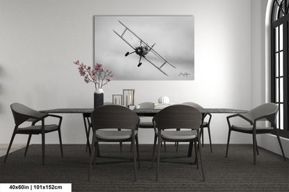 a black and white photo of a dining room table