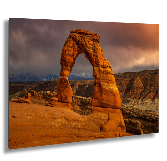 a large rock formation in the middle of a desert
