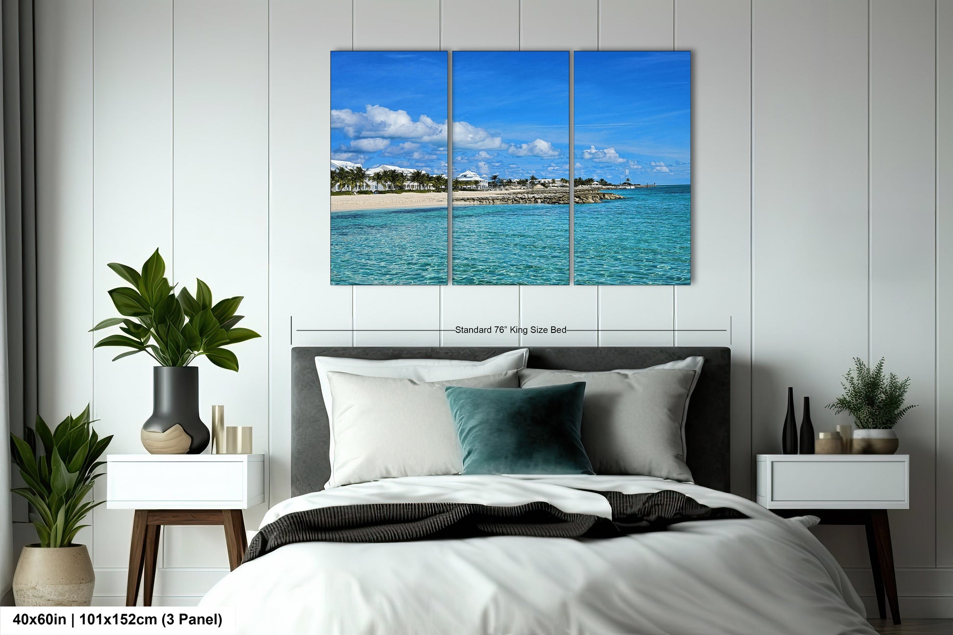 a bedroom with a large bed and a blue ocean