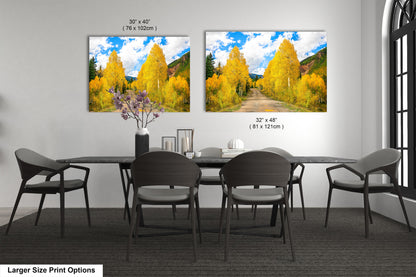 a dining room table with four chairs and two pictures on the wall