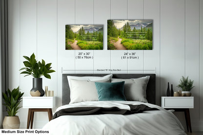 a bed room with a neatly made bed and two pictures on the wall