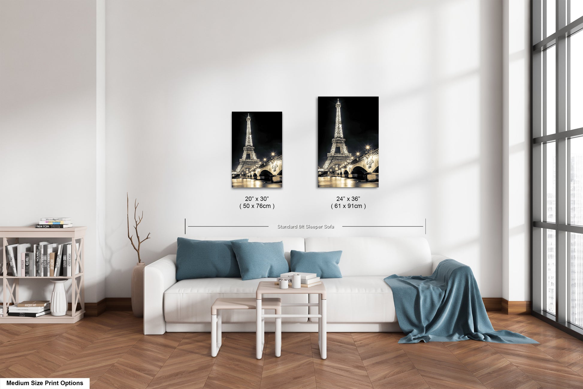 a living room with two pictures of the eiffel tower