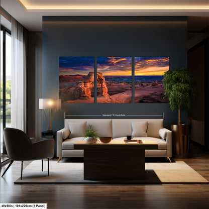 a living room filled with furniture and a painting on the wall