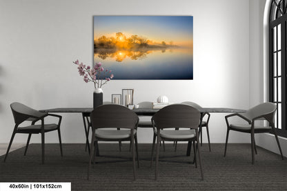 a dining room table with chairs and a painting on the wall