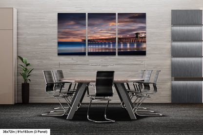 a dining room with a table and chairs