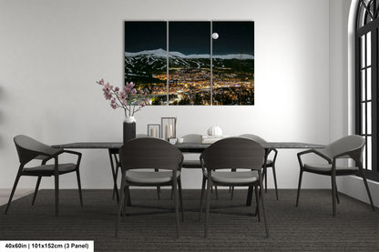 a dining room with a table and chairs