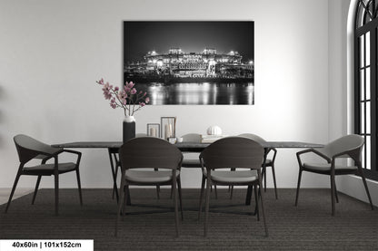 a black and white photo of a dining room table