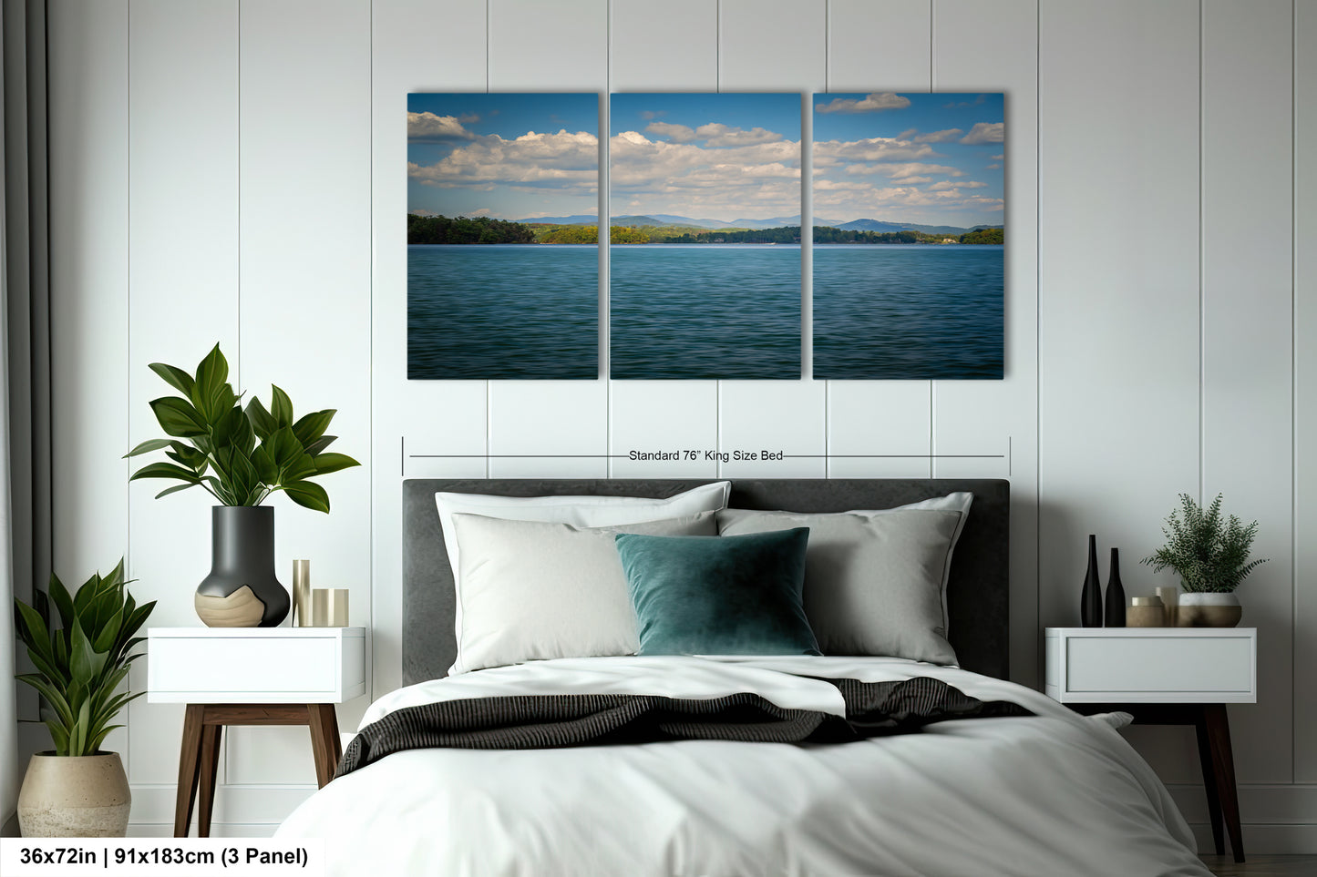 A bedroom with a large bed, nightstands, and a large wall art depicting a serene lake scene with mountains in the background.