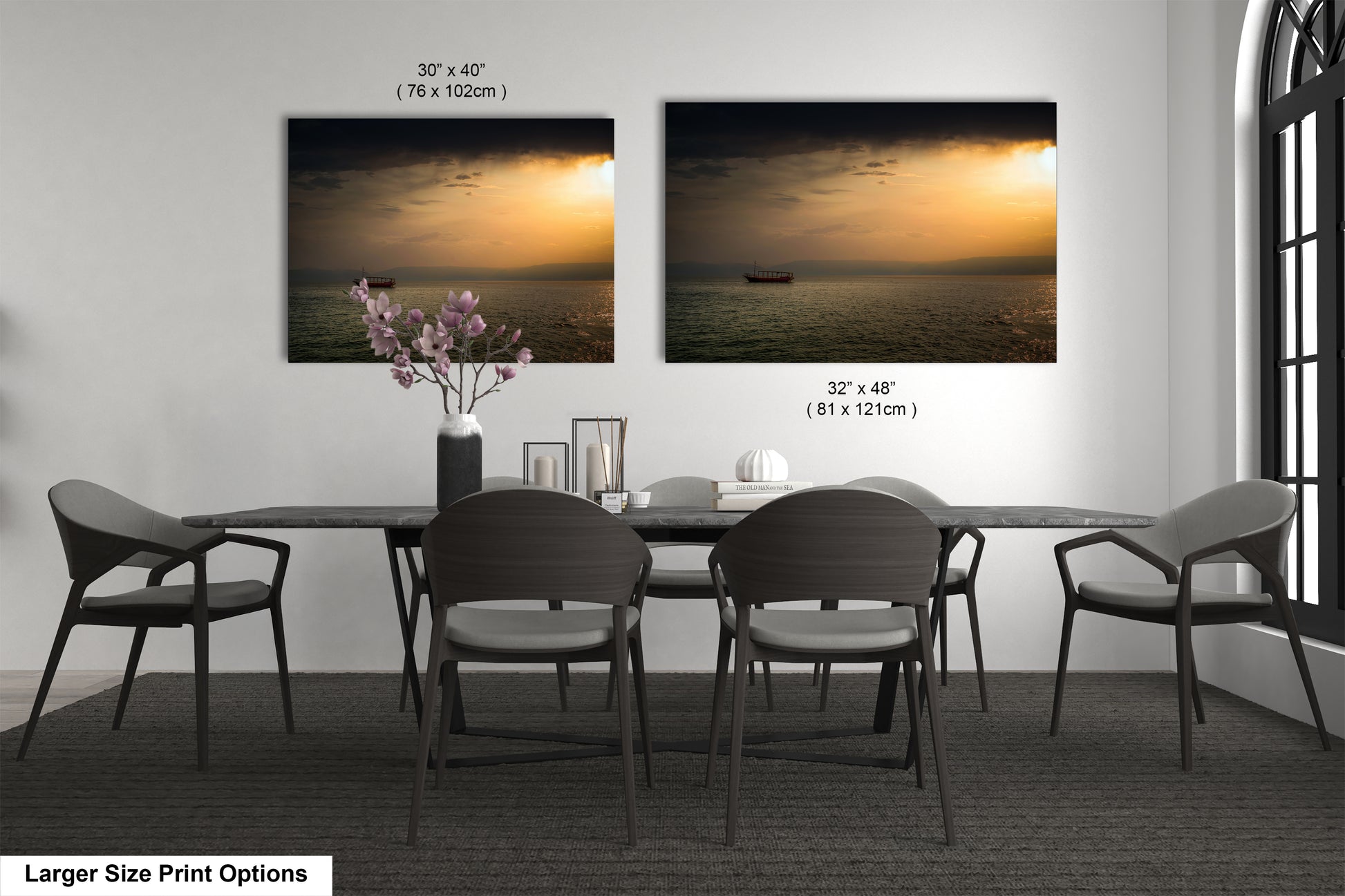 a dining room table with chairs and a vase of flowers