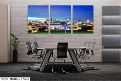 a dining room with a table and chairs with a city skyline in the background