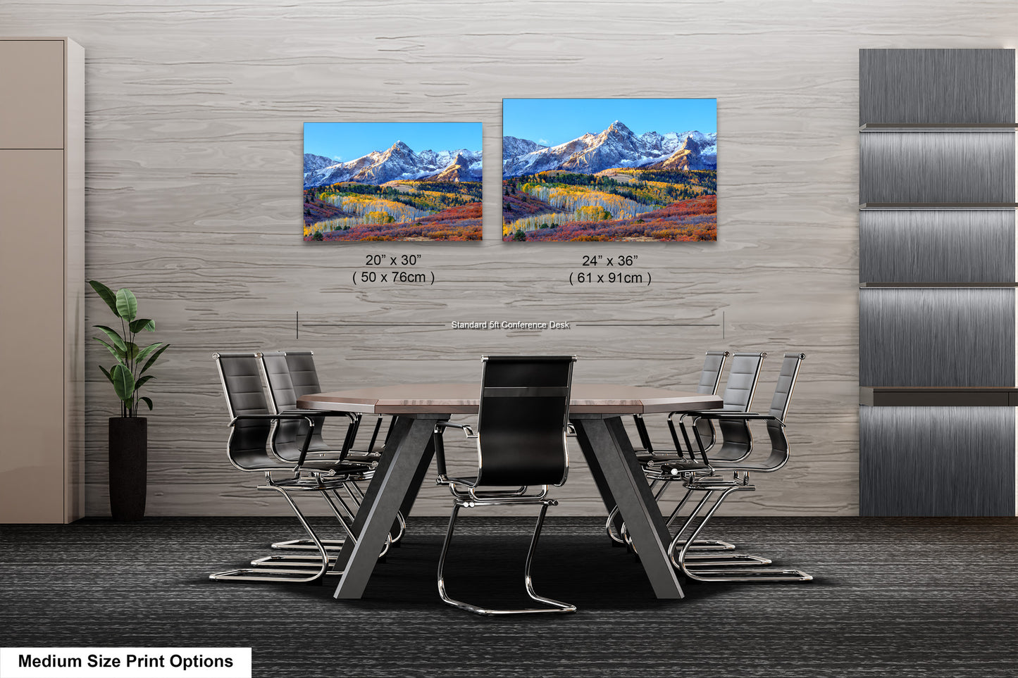 a dining room table with chairs and a painting on the wall