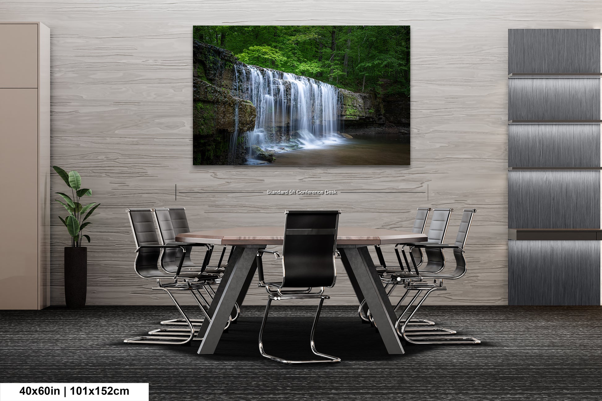 a dining room table with chairs and a painting of a waterfall