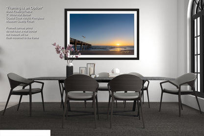 a picture of a dining room with a table and chairs