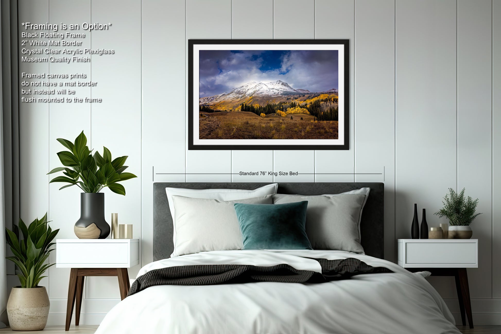 a bedroom with a bed and a picture hanging on the wall